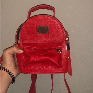 Faux red leather mini backpack